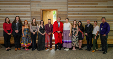 Group photo of medical and midwifery graduates, faculty and staff during the Indigenous graduation ceremony last week at the UBC First Nations Longhouse.